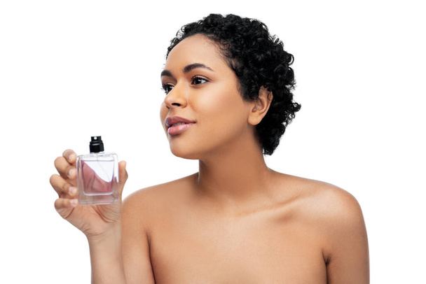 young african american woman with perfume - Фото, зображення
