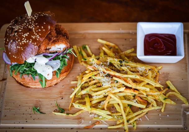 tasty delicious home made burgers with french fries - 写真・画像