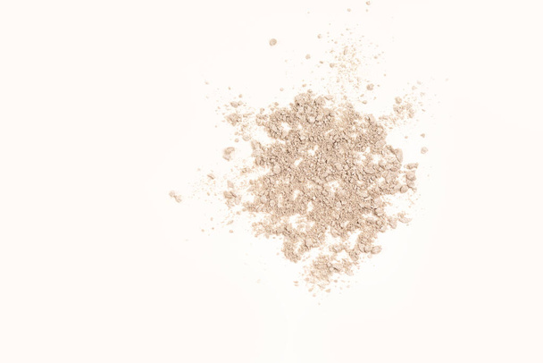 Crushed silver eye shadow on a white background . Space for text - Фото, изображение