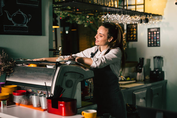 waitress preparing espresso coffee in cafeteria - Foto, Imagem