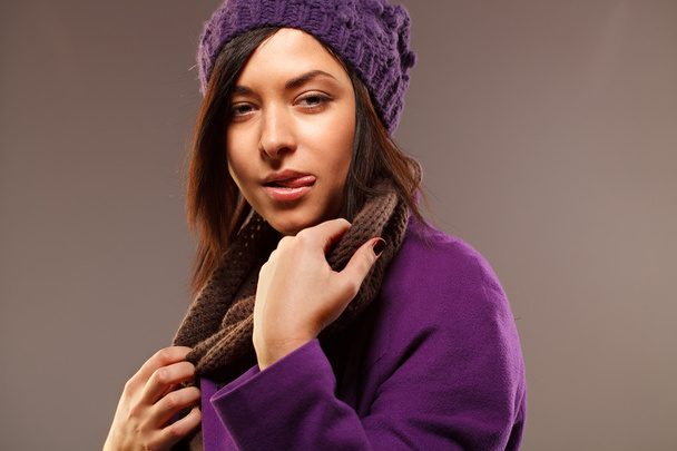 Stylish beautiful woman with violet coat - Foto, afbeelding