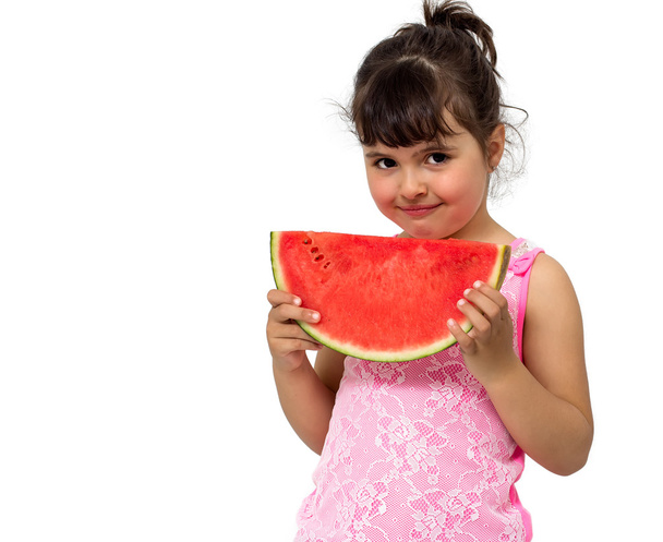 Little girl eating watermelon - 写真・画像