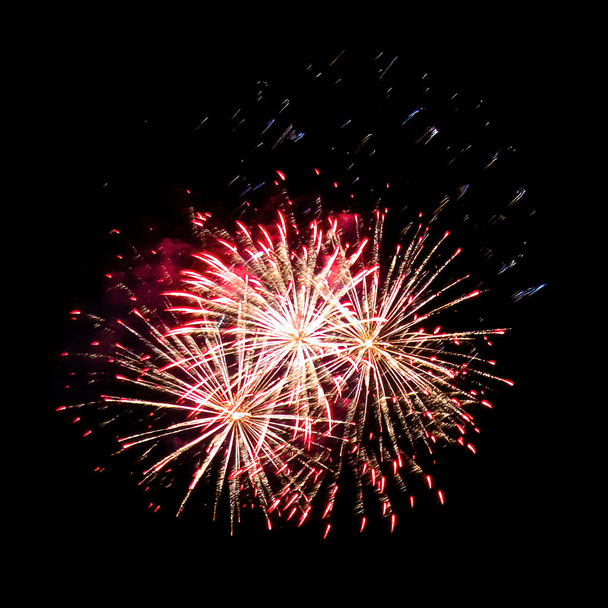 Colorful fireworks isolated on black sky background. - Valokuva, kuva