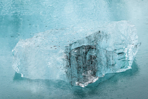 A closeup of big ice on a frozen lake - Photo, image