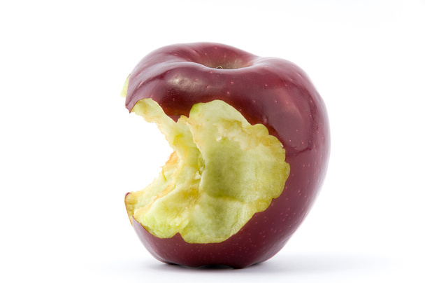Pomme rouge mâchée
 - Photo, image