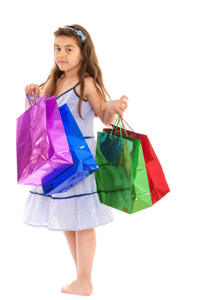 little girl with packages - Foto, Imagem