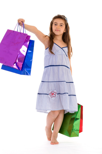 little girl with packages - Foto, Imagem