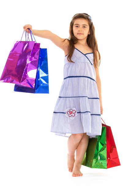 little girl with packages - Foto, Bild