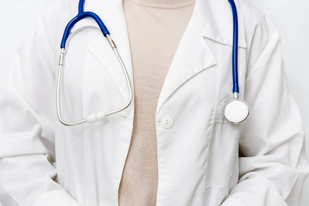 Medicine doctor close up in white coat with stethoscope. Healthcare and medical concept. - Foto, afbeelding