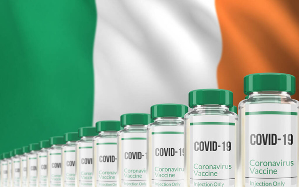 背景にアイルランドの旗を持つ複数のCovid-19ワクチンバイアルの列。大量生産と接種の概念。3Dレンダリング. - 写真・画像