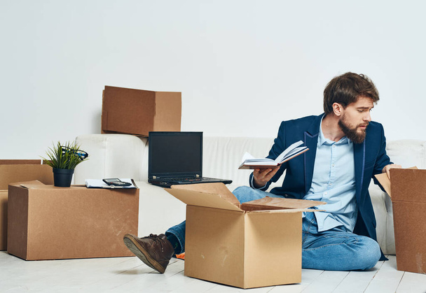 Business man boxes with new office  unpacking lifestyle. High quality photo - Photo, Image