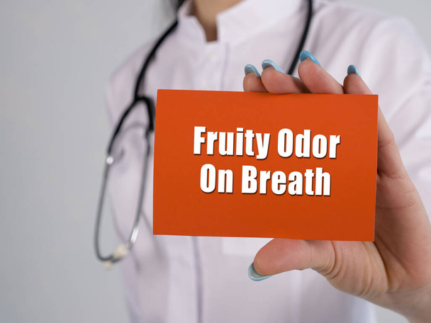 Medical concept about Fruity Odor On Breath with sign on the piece of paper - Photo, Image