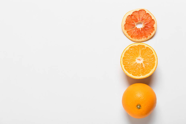 Tasty oranges on white background - Foto, Bild