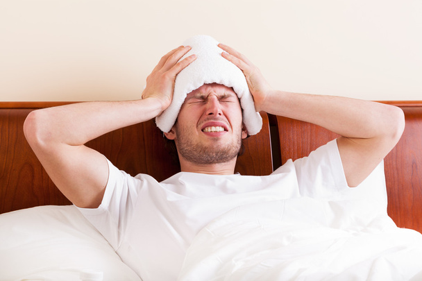 Man suffering from headache - Photo, image