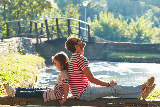 Daughter and father enjoying outdoors nature. - Foto, Bild