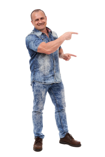 Caucasian man pointing to the side of the image, full length isolated on white background - Foto, Bild