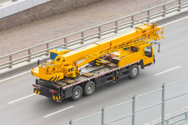 Mobile crane truck driving on the highway - Photo, Image