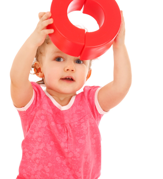 Portrait of a little girl in a helmet with blocks - Foto, afbeelding