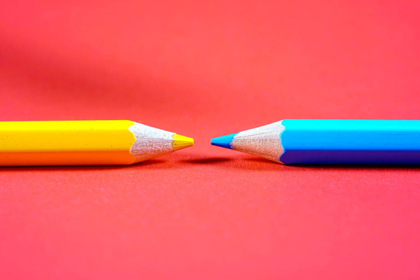 Colorful crayons, pencils with plain paper as a background with structure                           - Φωτογραφία, εικόνα