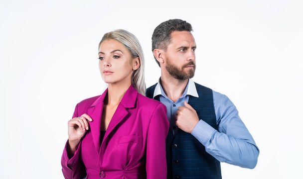 blonde woman in pink jacket atouch man. businesspeople. - Foto, afbeelding
