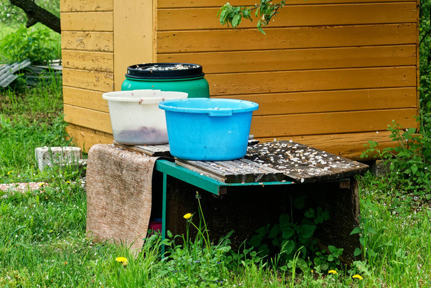 plastic basins in the garden, spring - Photo, Image