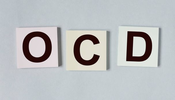 OCD abbreviation, mental disorder. Psychological concept. Obsessive compulsive disease - Photo, image