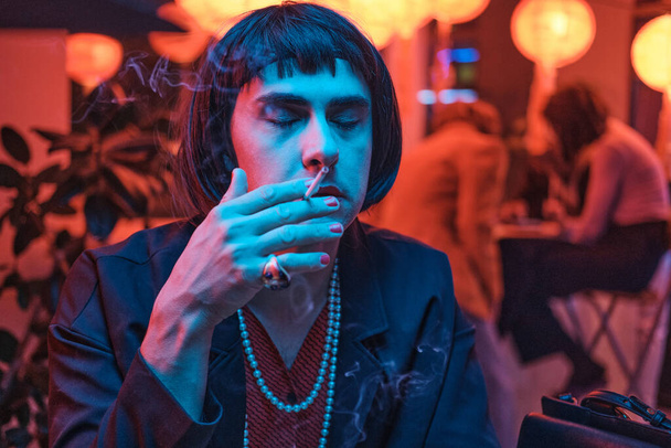 Transsexual enjoying the cigarette - Photo, Image
