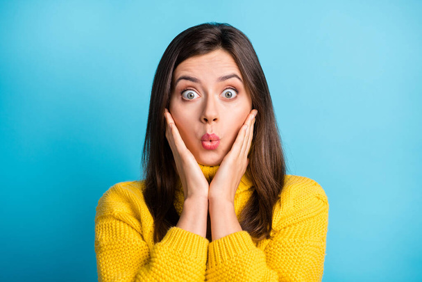 Close-up portrait of lovely funky amazed girl news wow reaction pout lips touching cheeks isolated over bright blue color background - Foto, Imagen