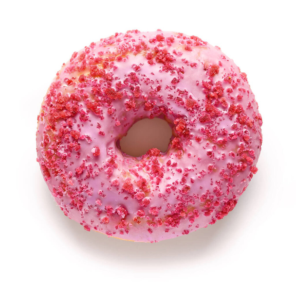 frisch gebackener rosa Donut isoliert auf weißem Hintergrund, Draufsicht - Foto, Bild