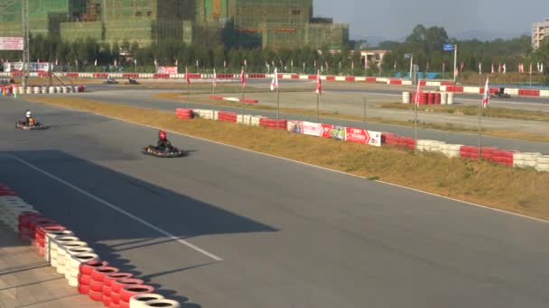 Kart sports and racers on the track are driving karts - Footage, Video
