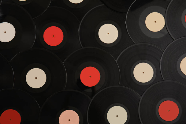 Vintage vinyl records as background, top view - Фото, изображение