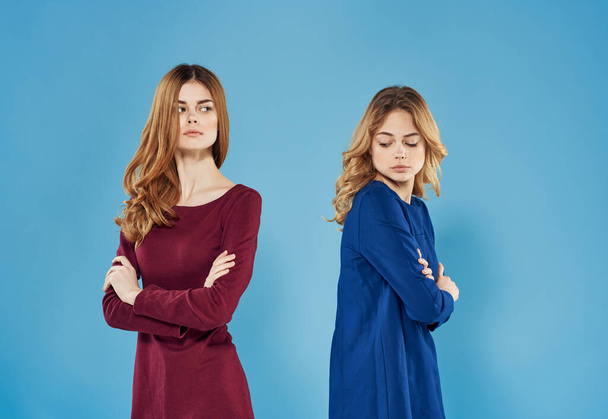 Elegant women dress emotions communication cropped view blue background - Фото, изображение