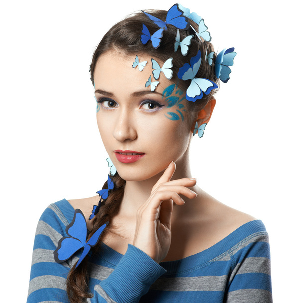 Tyttö taiteen meikki sininen perhosia
 - Valokuva, kuva