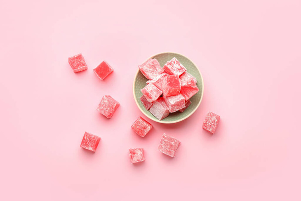 Bowl with Turkish delight on color background - Photo, Image