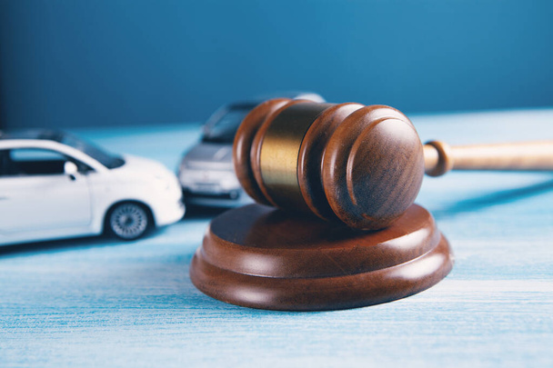 Model of car and gavel. Accident lawsuit or insurance, court case. - Photo, image