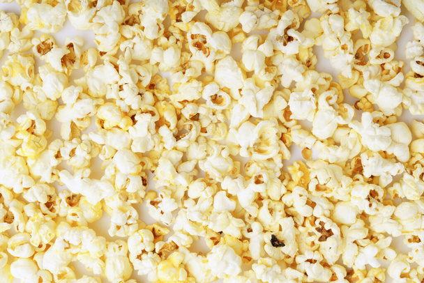 background from popcorn. top view of pop corn. texturing background - Photo, Image