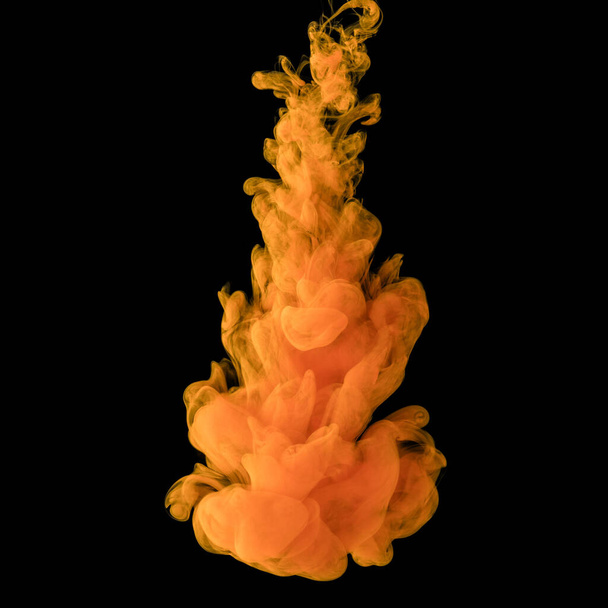 Explosion of colored, fluid and neoned liquids on black studio background with copyspace - Foto, Imagen