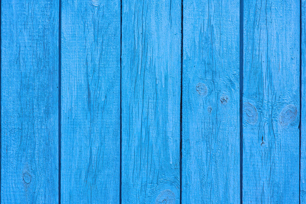 Old blue wooden wall of a house with cracked oil paint. Bright colorful vintage wood background - Φωτογραφία, εικόνα