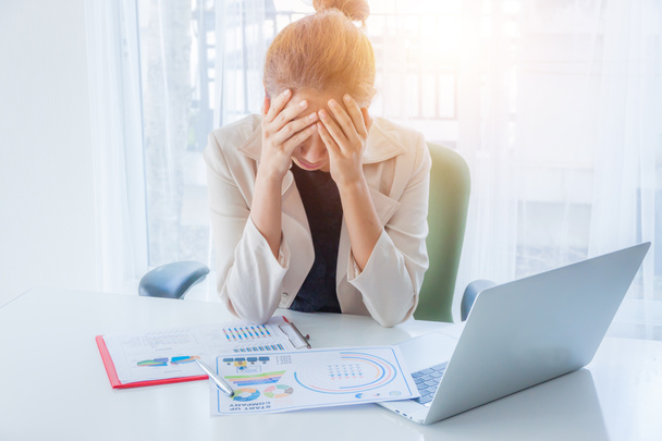 seriously asian woman in office business concept, Business woman who is tired, business woman is stressed from work , business concept. - Photo, Image