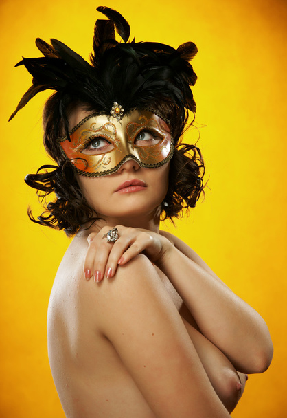 The sexy girl in a mask - 写真・画像