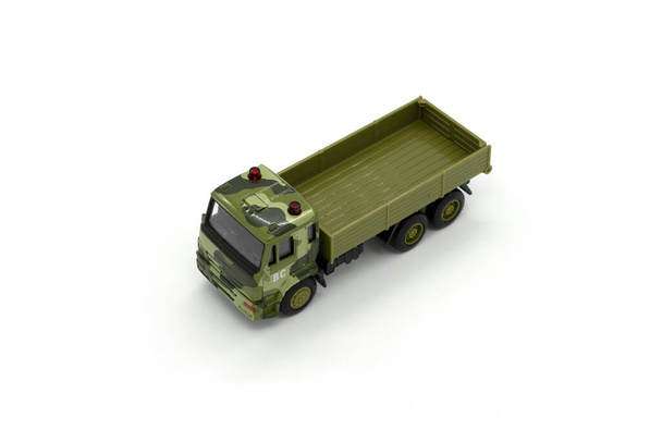 Military toy cargo truck is isolated on white background. - Photo, image