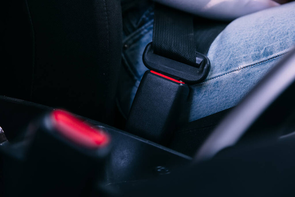 Black seat belt will clasp on the lock - Photo, Image