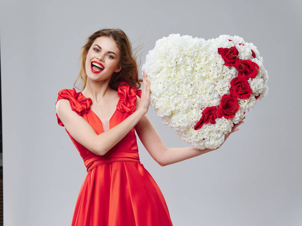 heart of decorative flowers woman in red dress valentines day - Photo, Image