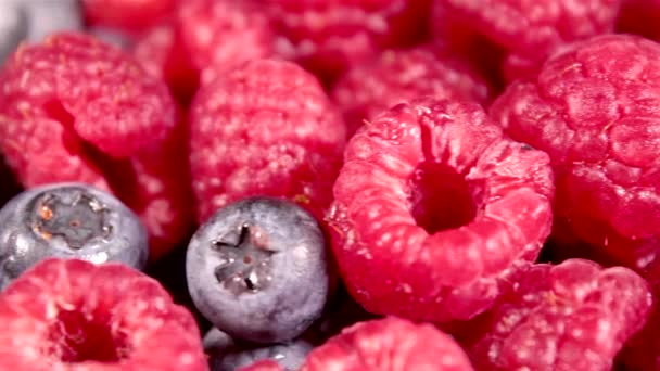 Blueberries and strawberries ready to be eaten. Bio organic vegan vegetarian food. Healthy breakfast preparation. - Footage, Video