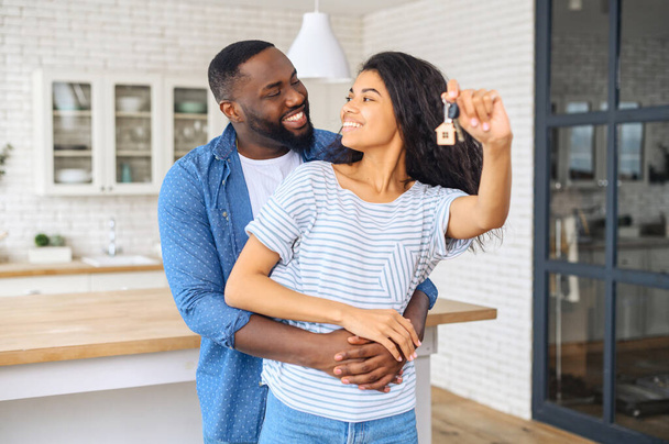 The young african american happy couple is moving into a new house - Photo, image