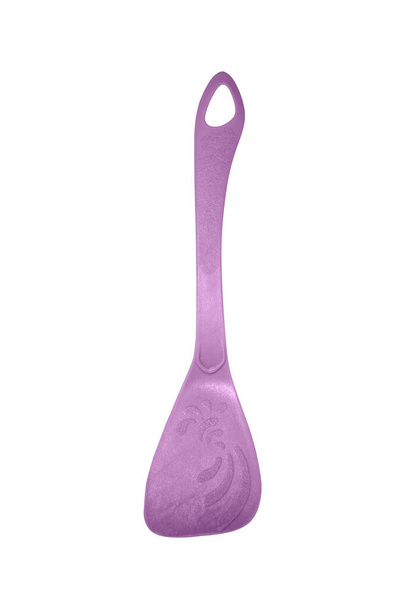 Plastic cooking spatula for cooking on a white background.Kitchen spatula made of plastic top view. - Photo, Image