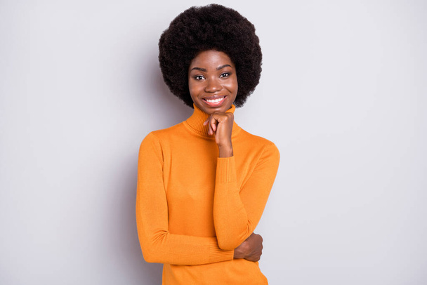 Photo of young attractive afro woman happy positive smile think hand touch chin isolated over grey color background - Photo, image