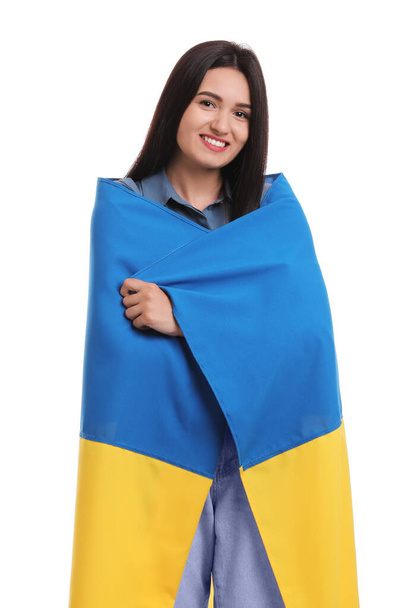 Young woman with flag of Ukraine on white background - Foto, imagen