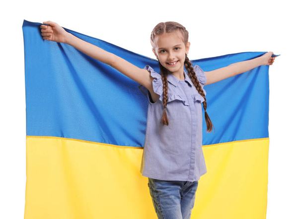Happy girl with flag of Ukraine on white background - Photo, Image