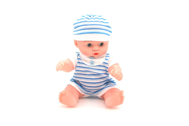 Nowo narodzona lalka izolowana na białym tle. - Zdjęcie, obraz